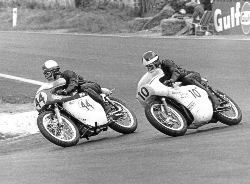  Alan Barnett on a 496cc Kirby Métisse leads Percy Tait on his 500 Triumph at the Belgium Grand Prix on July 6, 1969 
