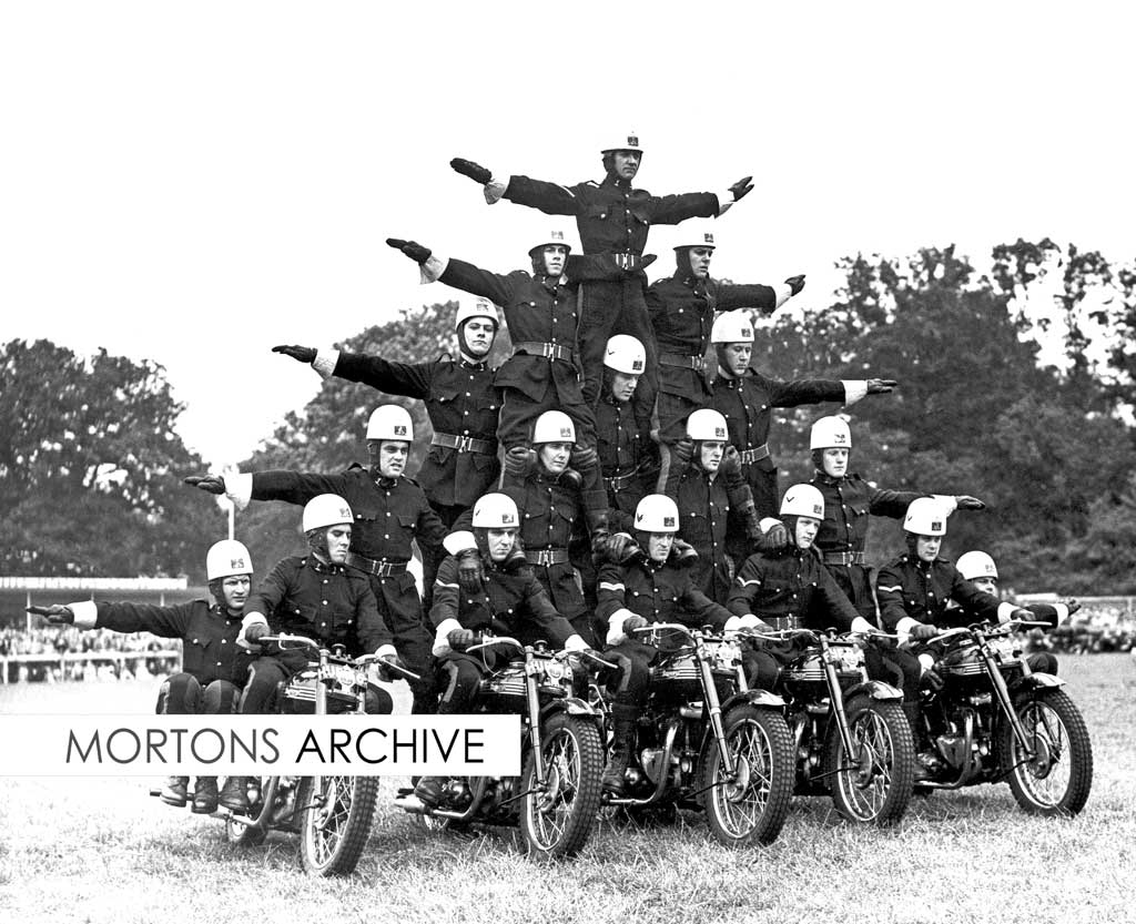 The White Helmets, the Royal Corps of Signals motorcycle display team, at Ravenham Park, London, in 1952. Motorcycles are Triumph 3Ts.