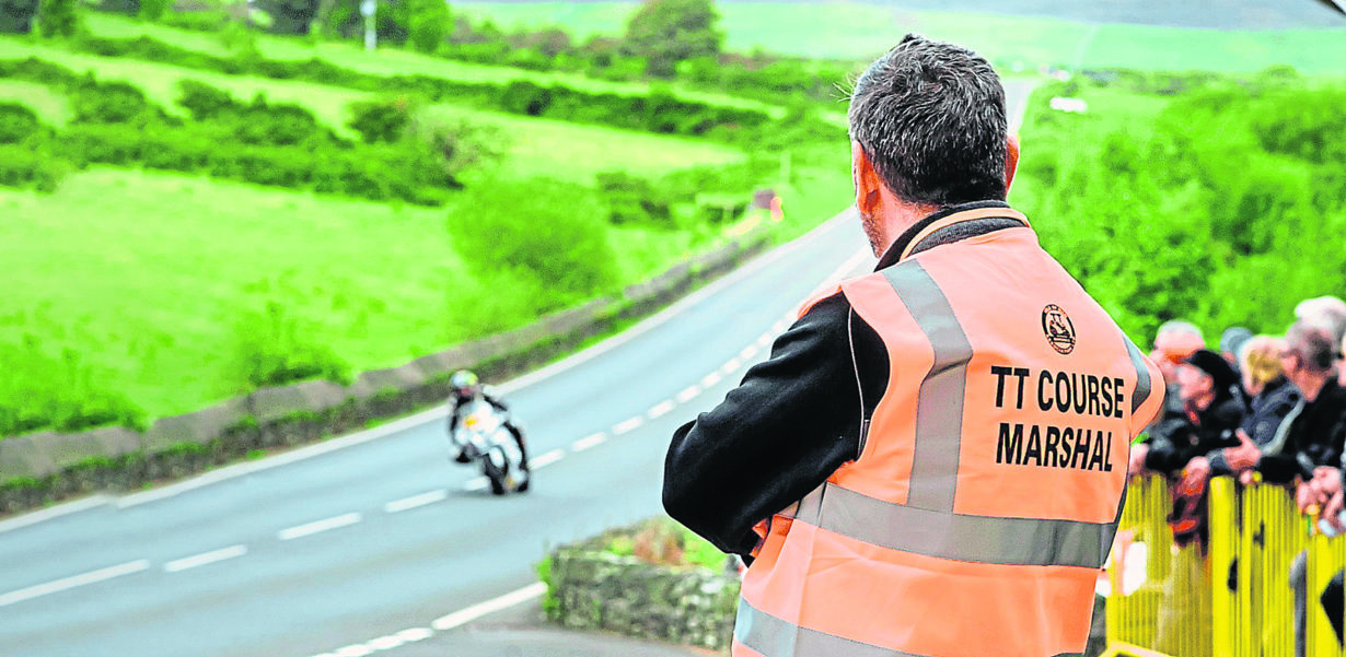 Get involved at the TT- sign on as a Marshal