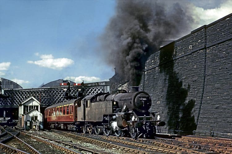 Low Moor Fairburn 4MT 2-6-4Ts No. 42283 blasts out of Bradford Exchange towards Mill Lane 'box with a Leeds service on July 23, 1967. DAVE RODGERS