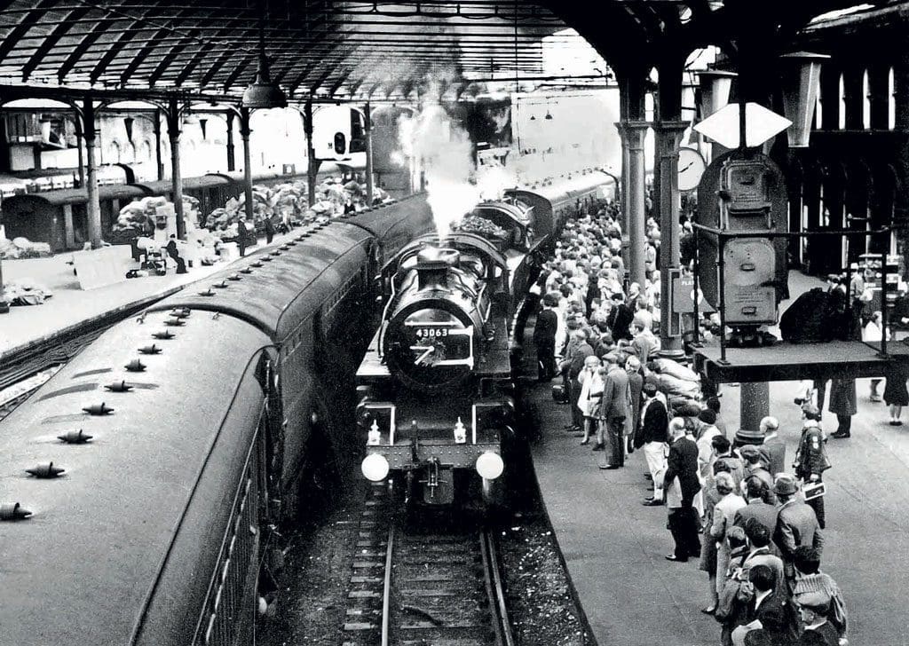 LMS Ivatt 4MT 2-6-0s Nos. 43063 and 43000 bring the stock for ‘The Wansbeck Piper’ into Platform 9 Newcastle Central station on October 2, 1966.