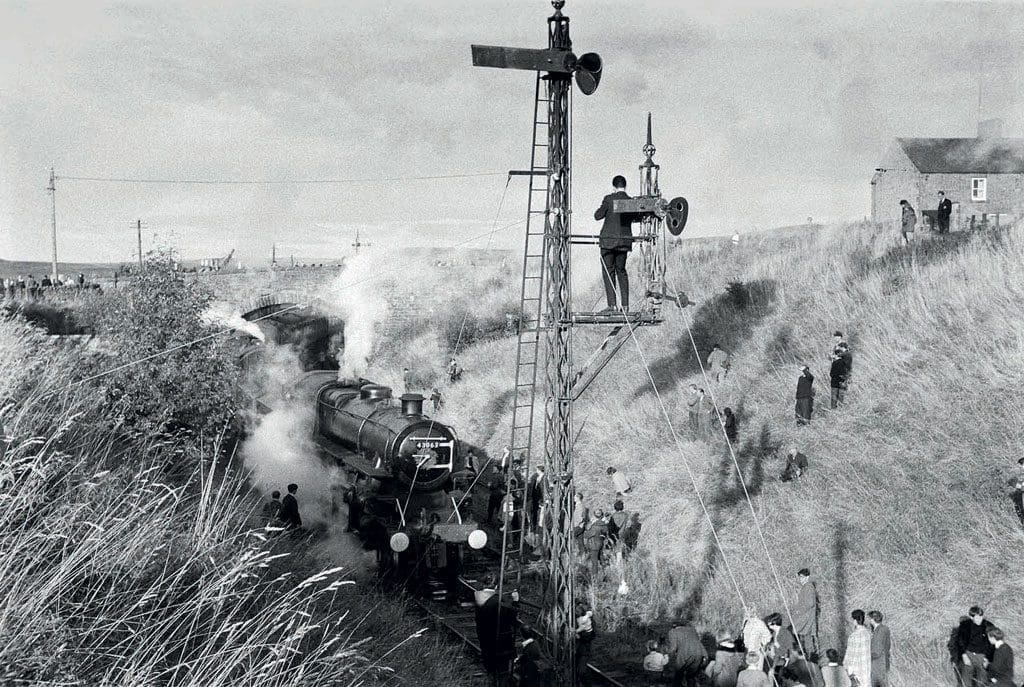 A sea of photographers at Woodburn. All possible vantage points were being used, particularly the old NBR signals.