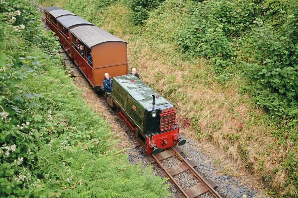 0-4-0DM No.9 Alf approaches Pendre with a short train that included the railway’s three open coaches.