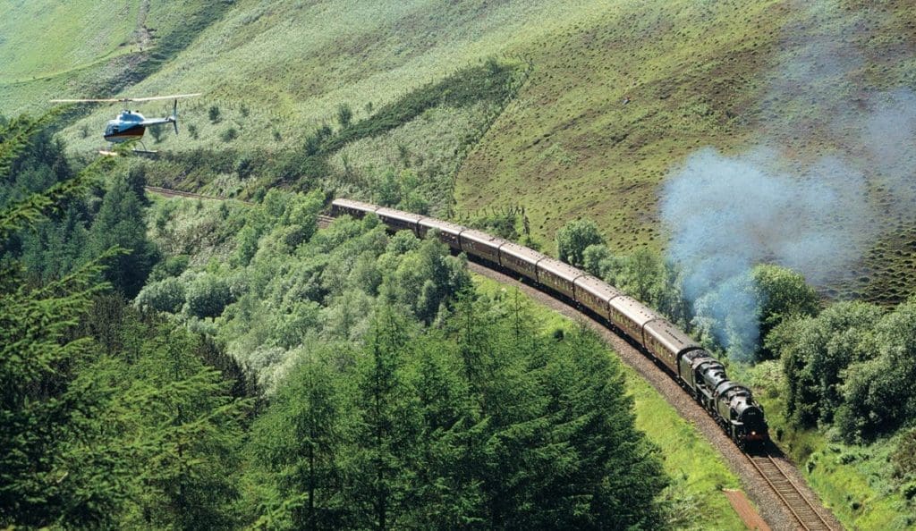 Preserved BR Standard 4MT 2-6-4T No. 80079 and LMS ‘Black Five’ No. 44767 George Stephenson are seen heading a charter into Sugar Loaf tunnel