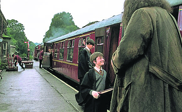 A young Harry Potter (Daniel Radcliffe) filming a scene in the first Harry Potter movie.