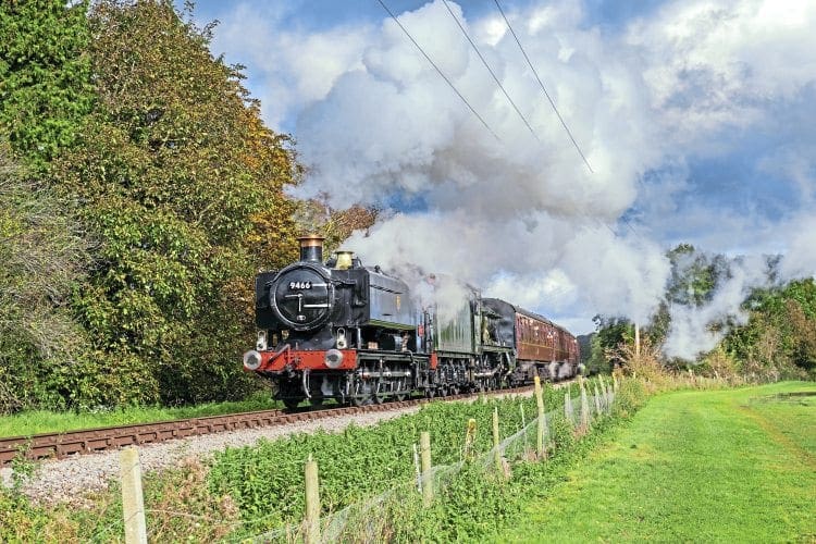 GWR Pannier Tank No. 9466 double heads with 7903 Foremarke Hall on a test run on the GWSR to Cheltenham Racecourse.