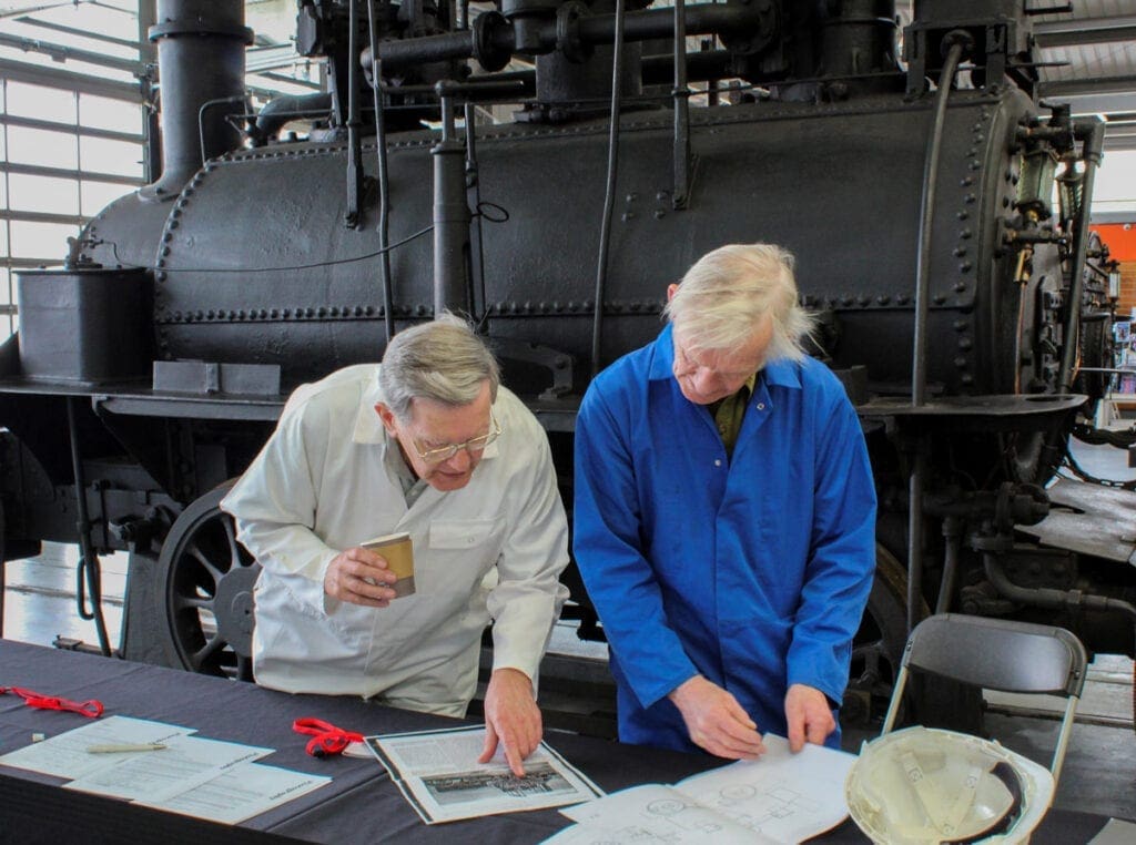 Dr Michael Bailey and Peter Davidson with the Hetton locomotive