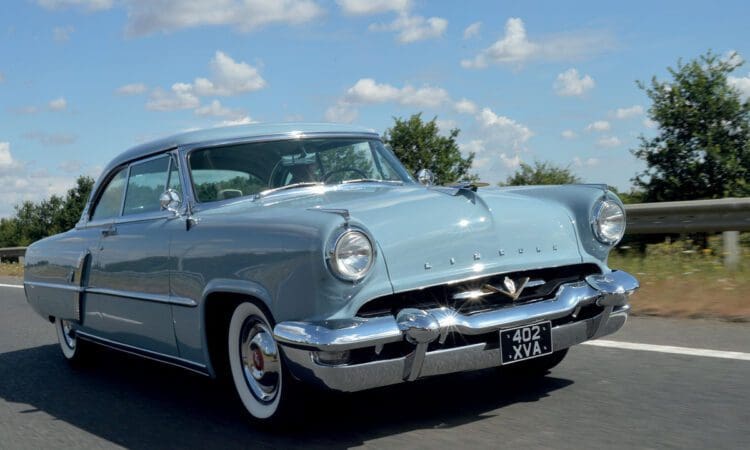 Pale blue 1953 Lincoln Capri two-door hardtop coupe car on road