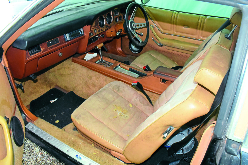 The interior of the black car.