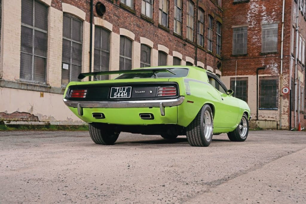 Green 1970 Plymouth Barracuda from behind.