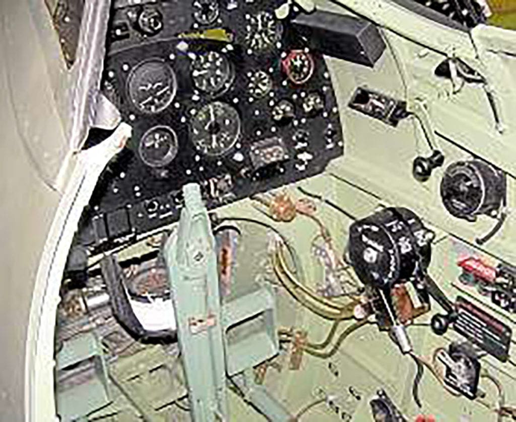 Cockpit view; the control column is still waiting for the spade grip.