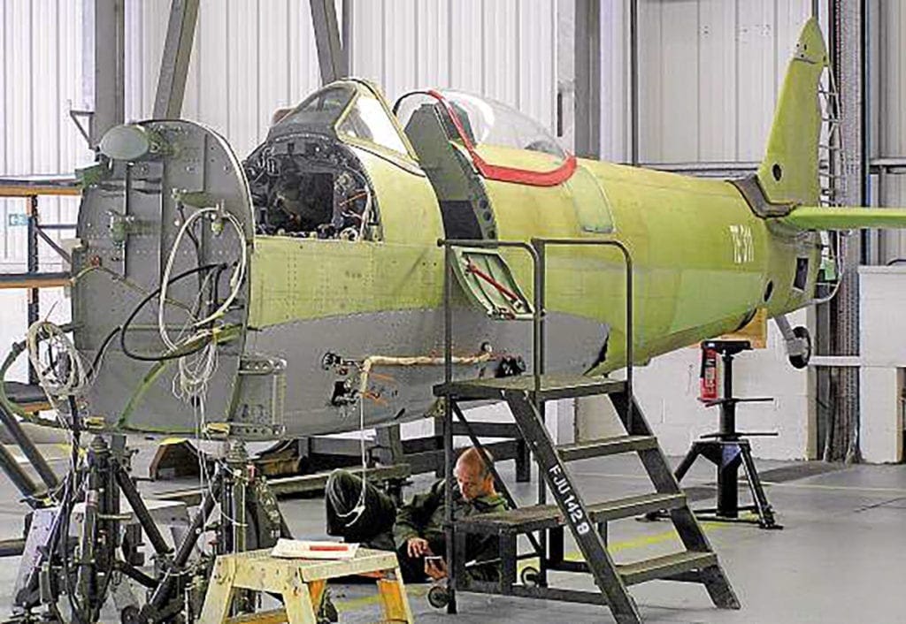 With restoration at Coningsby under way, TE311’s fuselage is seen with rivetting complete and awaiting engine bearer frames. All via author