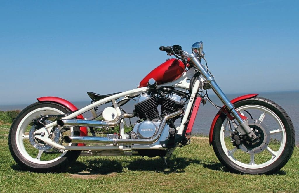 A side view of Glenn's bike with blue sky in the background.