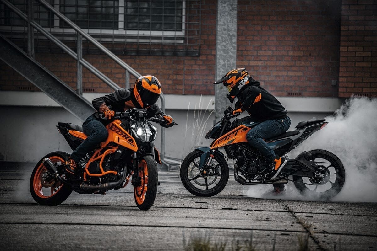 Two riders on the new KTM DUKE models, 390 and 125.
