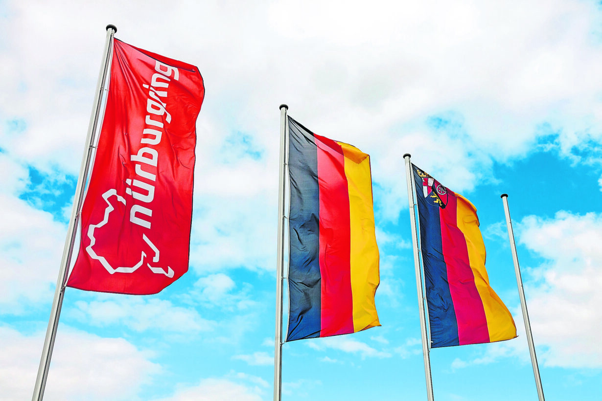 Nurburg: Flag at race track Nurburgring, labeled with "Nurburgring" and logo, two german flags at pole