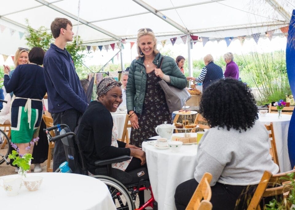 The Countess of Radnor enjoying an afternoon with patients and their loved ones at The Fabulous Summer Tea Party in Horatio’s Garden South West (Credit: Josh Humphrey, 2019)