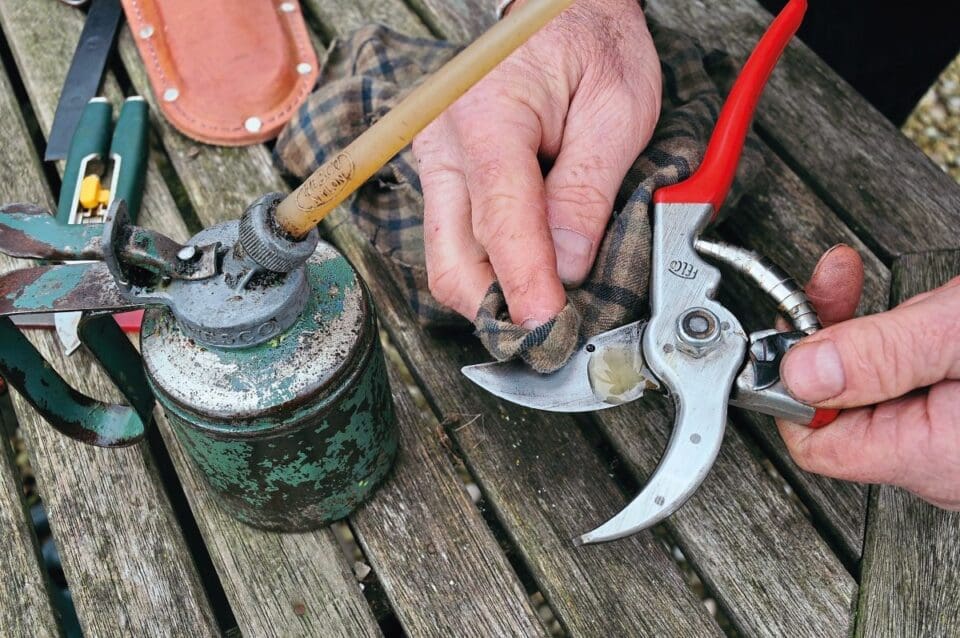 Lubricating garden tools after sharpening