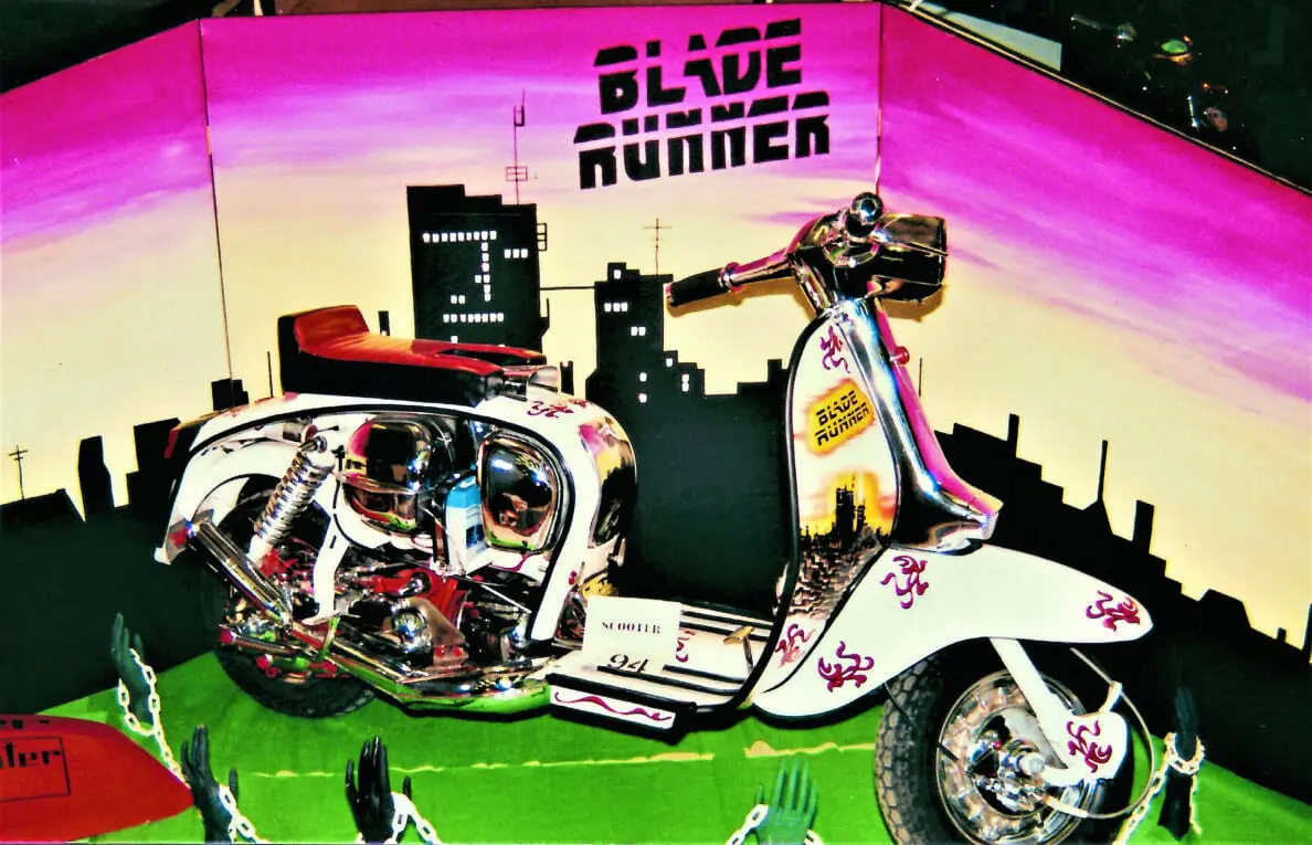 1) Imagine riding this scooter all the way to a custom show, carrying that display on the back!