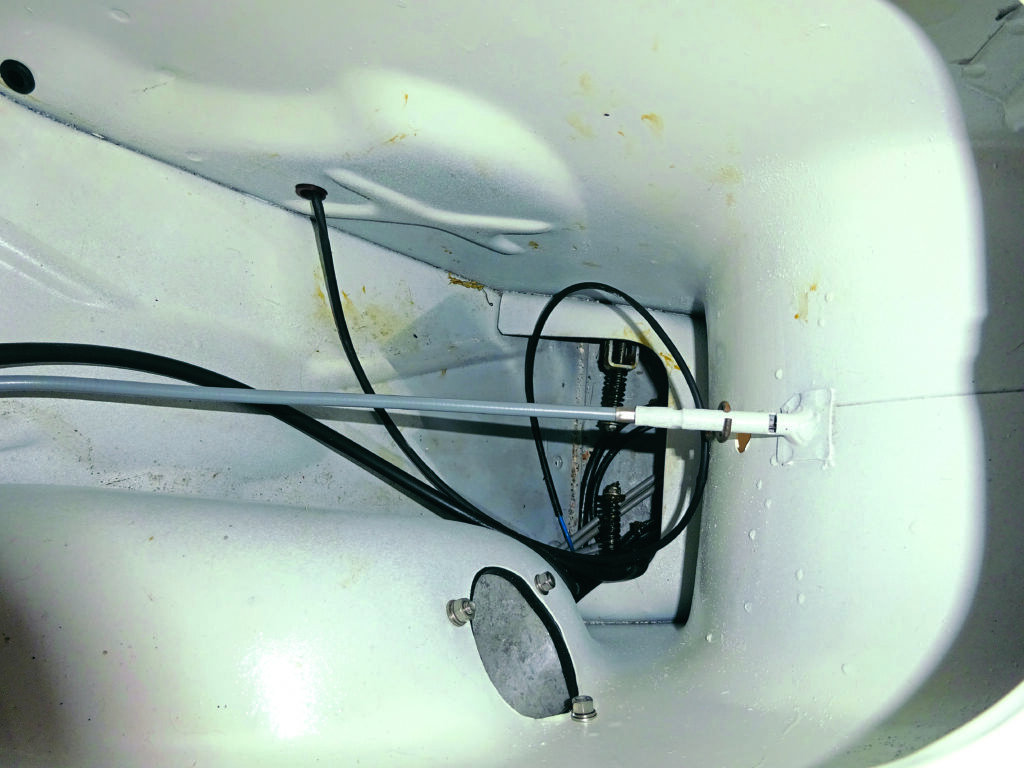 4: The outer cable can now be fed over the inner cable/wire to the point where it can be located into the chassis choke tube so its end can butt against the milled ‘end stop’ section. At this point it must be pointed out that, some remade choke cable outers are, sadly, manufactured with a plated brass end cap that is too large in diameter to fit into the chassis tube, so this cap and the adjacent plastic coating must be removed for the above instructions to be viable. The next stage in the installation is to feed the carb end of the complete choke cable through from the monocoque towards the engine and carb. This should follow the path of the throttle cable.