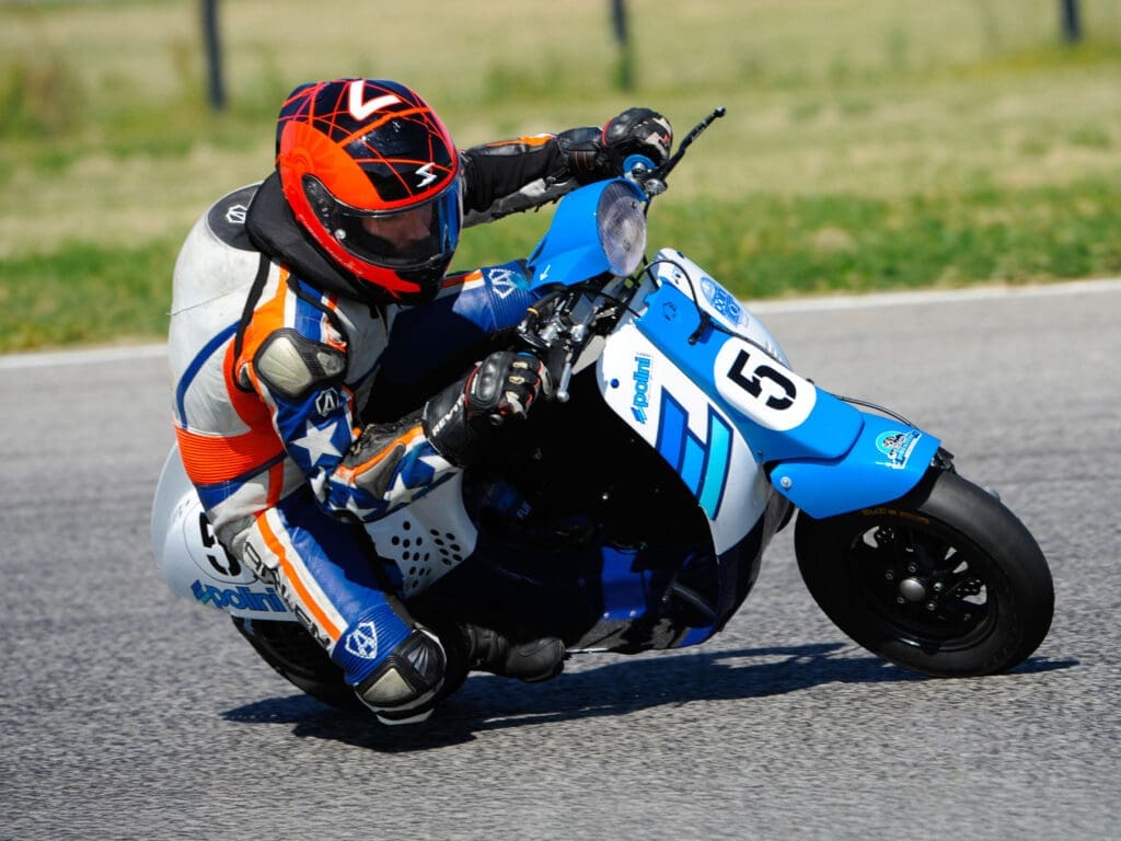 Three riders, eight pit-stops, one scooter.