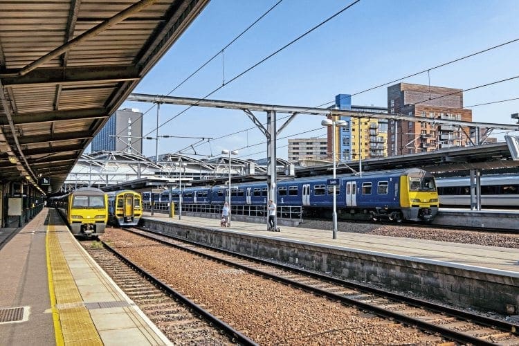 Northern multiple units await their next duties in the former parcels platforms at Leeds
