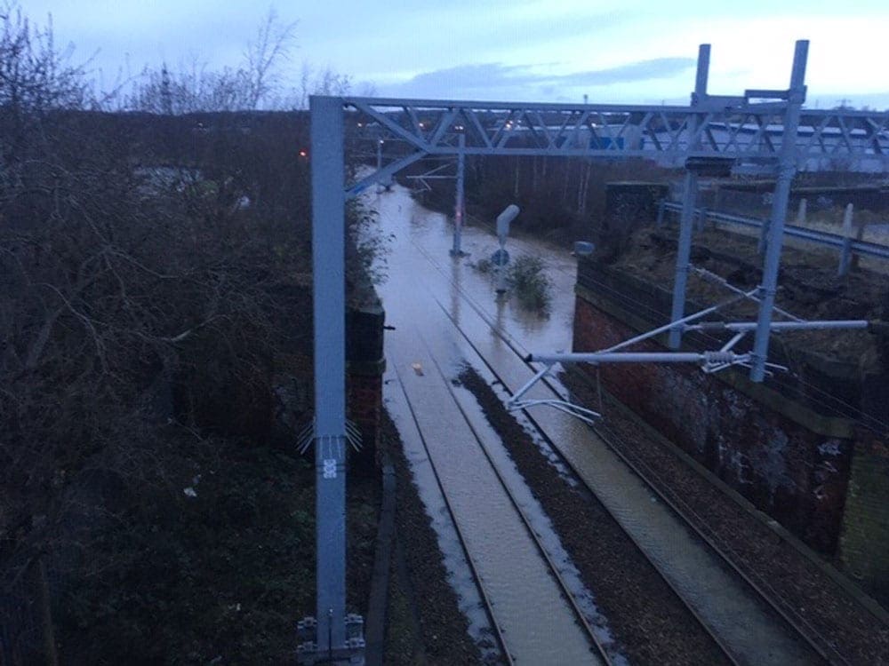 Storm Dennis is continuing to cause transport chaos as train lines and roads are blocked by flooding and fallen trees.