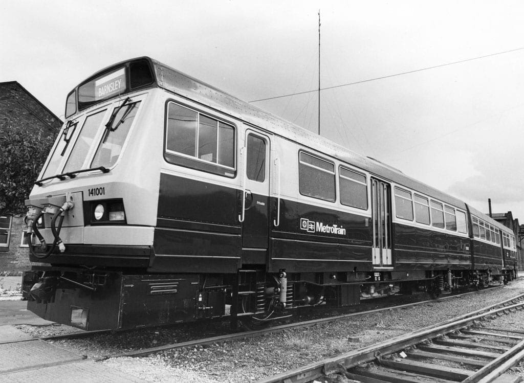 Black and white image of a metro train.