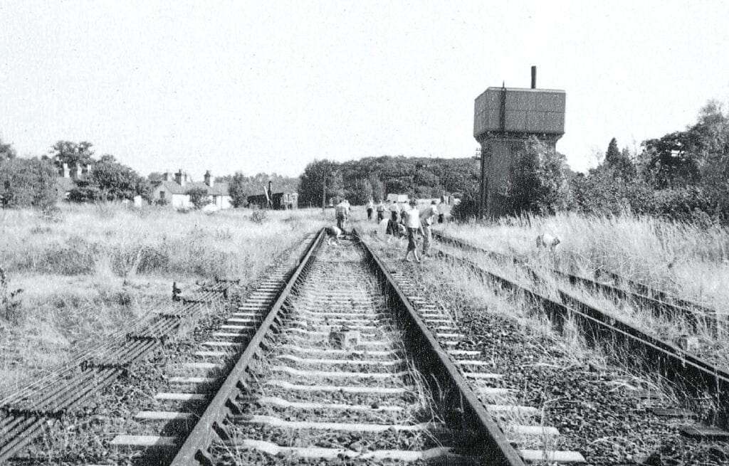 Clearing weeds from the track in 1959. Photo: Bluebell Railway Archive