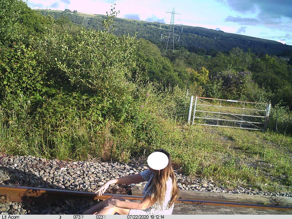 Stark warning as images reveal people posing for photos on rail lines