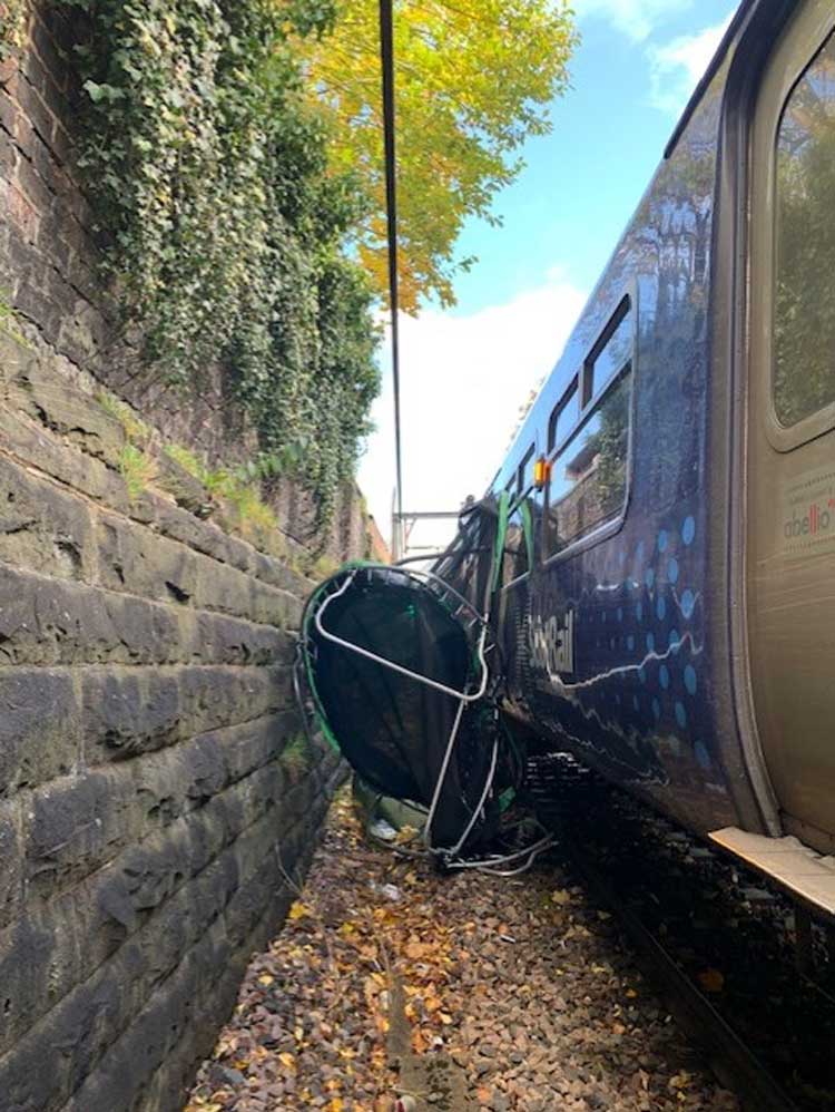 Trampoline caught between train and embankment as storm hits Scotland
