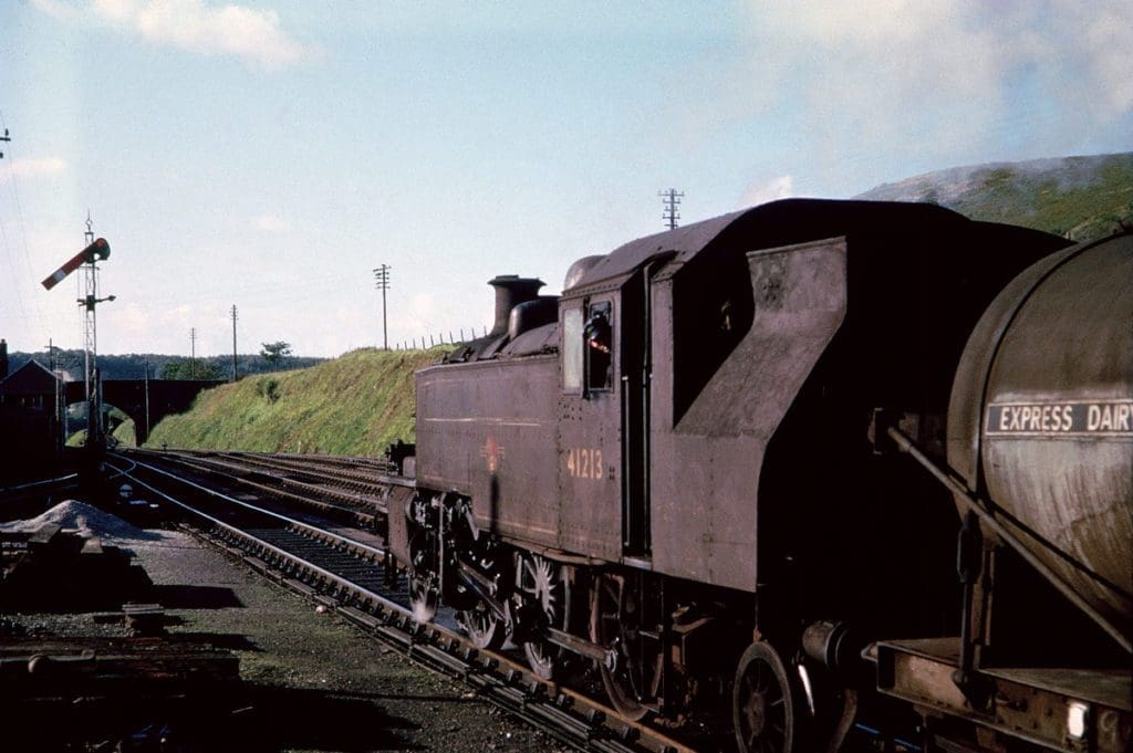 Ivatt '2MT' No 41213 shunts a mixed milk/passenger duty at Torrington in 1963.