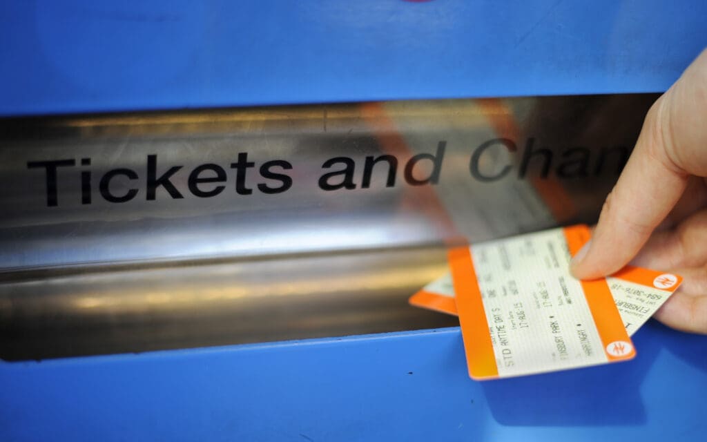 Undated file photo of a person buying a train ticket.
