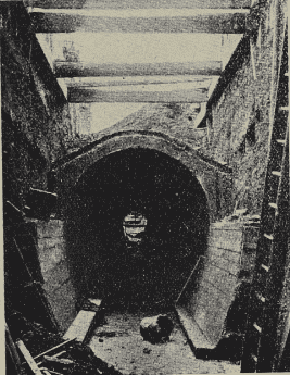 Photo: courtesy R. Ackrill & Co. The tunnel under construction in 1907. It was 9 ft. high and lined with concrete