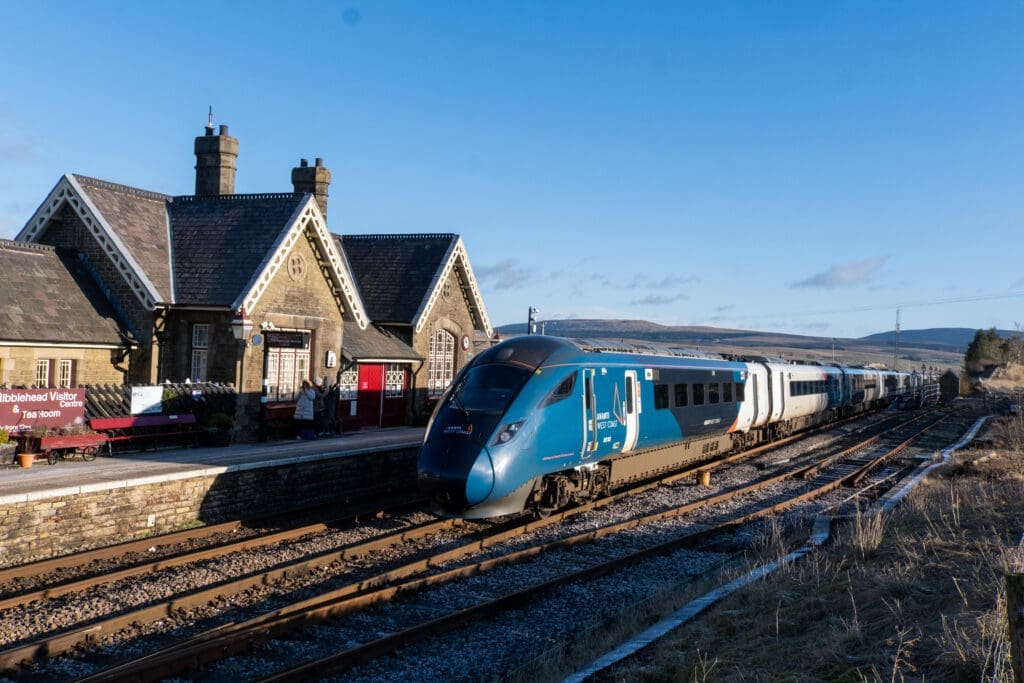With unit No. 805003 leading 805006, the 11.55 Wigan North Western to Carlisle is 14 minutes down on schedule as it passes Ribblehead station on January 3. CHRIS MILNER