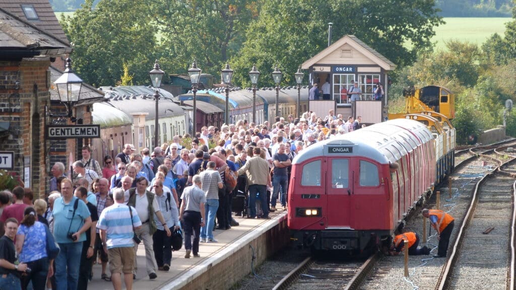 As engineers make adjustments to the leading car of the Cravens Heritage Trains Limited three-car unit, a significant crowd waits to board a service during the ‘End of Tube’ event, hosted by the Epping Ongar Railway in September 2014. The Epping to Ongar section of London Underground was closed on September 30, 1994, due to low passenger usage and high operating costs. PETER SCOUSE