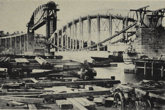 Photos: British Railways, Western Region The bridge taking shape in 1858, the year before it was opened to traffic. One main span is in position and that on the Devon side is ready to be raised as the masonry pillars are built up