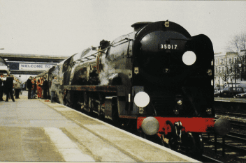 ‘Clan Line’ – posing as long-lost classmate No. 35017 ‘Belgian Marine’ – awaits departure with the Southampton Boat Train at Kensington Olympia on April 14, 1996. Joan Jackson.