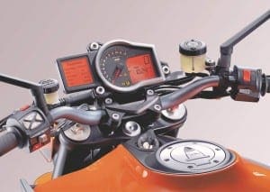The three riding modes, and ABS & traction control can be set with the buttons on the left bar.