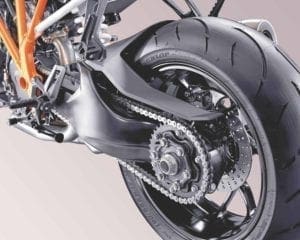 A single sided swingarm allows the exhaust to tuck up and out of the way for greater lean angles.