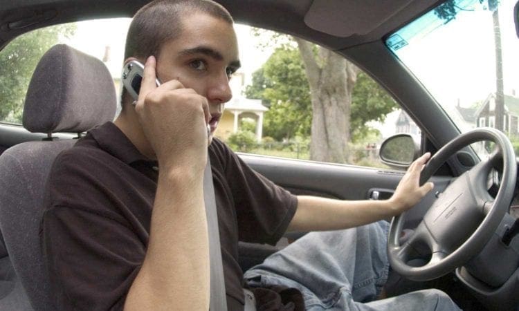 Younger male drivers still using a mobile phone when driving