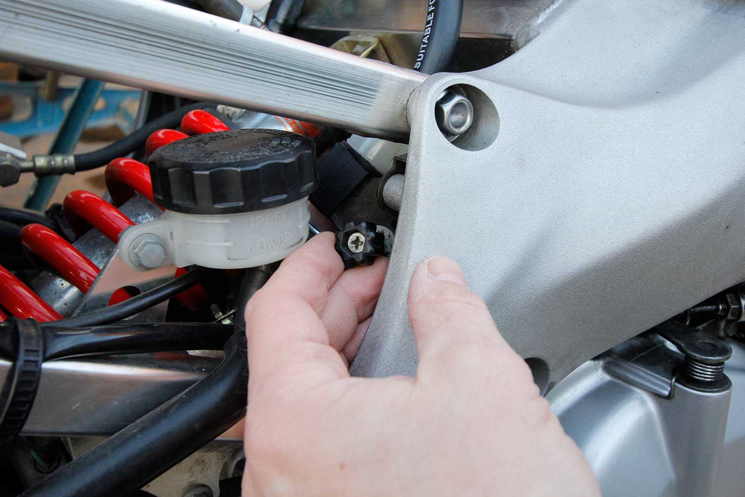 6 Start the engine and let it warm up, then adjust the idle screw to bring the engine speed up a fraction, helping the gauges to run more smoothly.