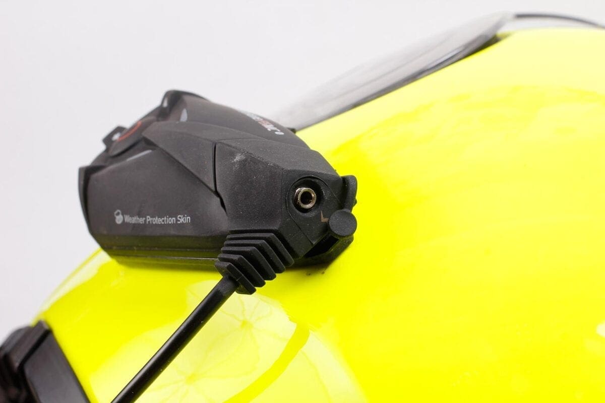 Charging port doubles as auxiliary input