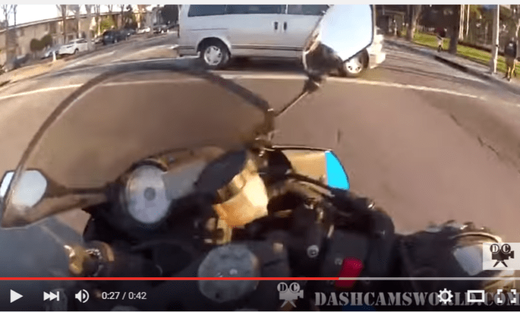 VIDEO: Biker dodges four cars in super scary near miss