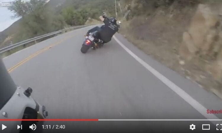 Video: INCREDIBLE canyon riding on a duffed up Harley. SERIOUSLY out there.