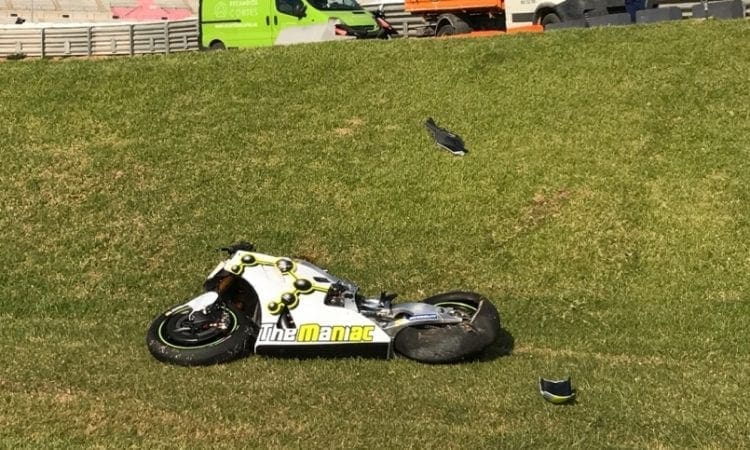 MotoGP: Andrea Iannone crashes out of the session, destroys factory Suzuki which then hits barrier so hard that the barrier needed rebuilding