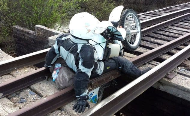 Video: Motorcycle falls through railway bridge… seriously…