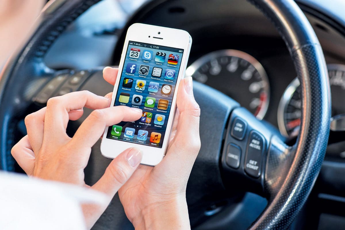 Incredibly drivers who text, scroll a music playlist, look at the internet or film/take photos can get away with it whilst driving because of a massive legal loophole. But not for much longer. 