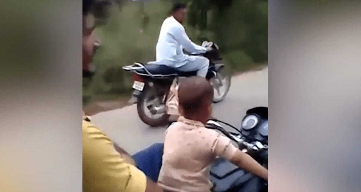 VIDEO: TODDLER takes control of bike. With TWO pillions on the back.