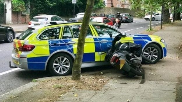Met Police officer under investigation for ramming moped rider. Could face criminal charges.