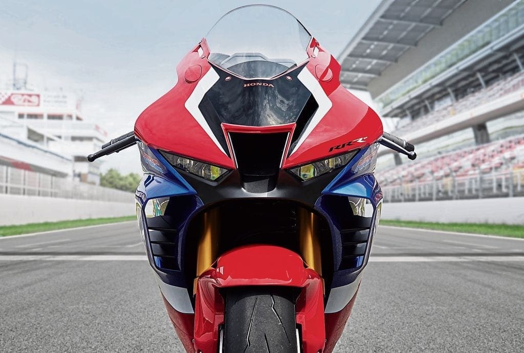 This is the face of the 2020 Honda Fireblade motorcycle. Specifically, this is the face of the SP version (which you can tell at a glance because of the gold coloured Ohlins forks). 